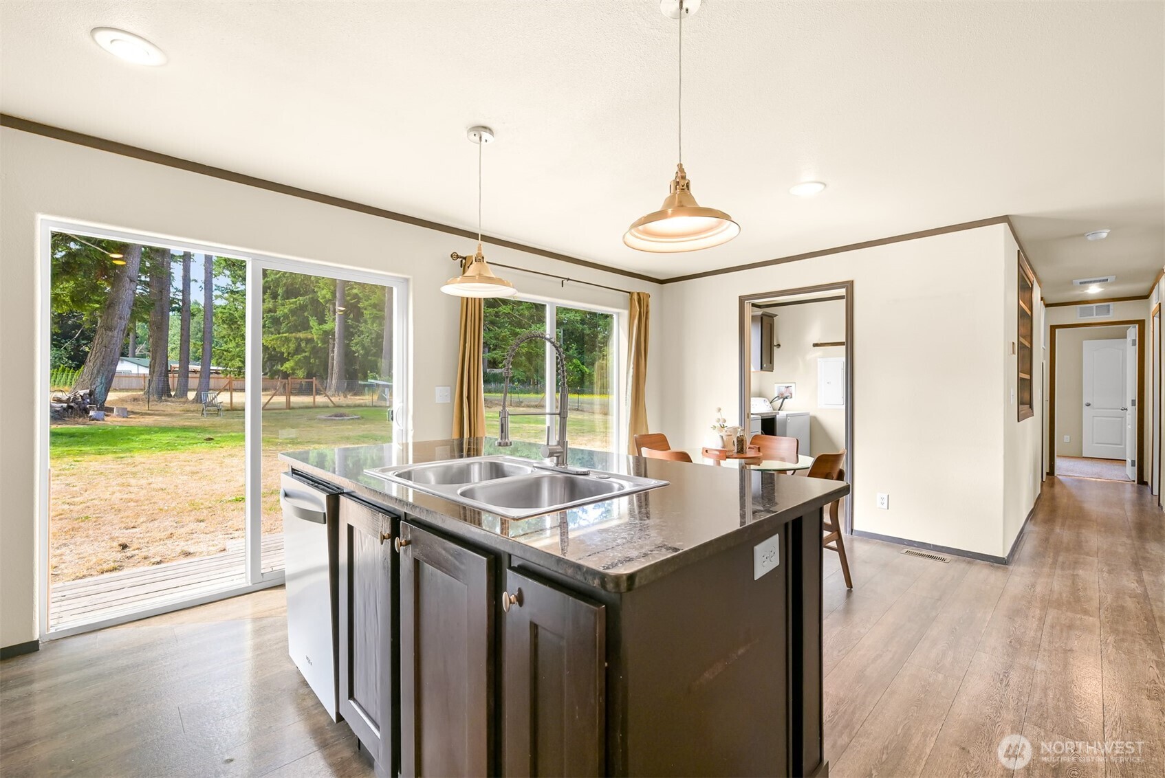 1229 West Axton Road Ferndale, WA 98248 - Photo 19 of 40 a dining hall with stainless steel appliances granite countertop a stove and a sink with granite countertops