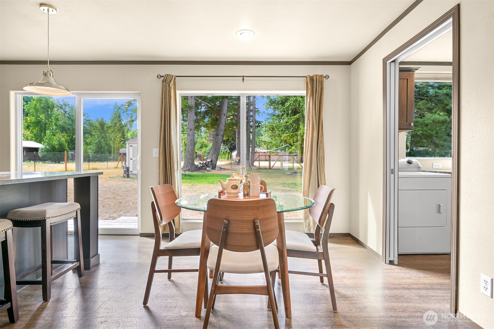 1229 West Axton Road Ferndale, WA 98248 - Photo 20 of 40 a view of a dining room with furniture window and wooden floor