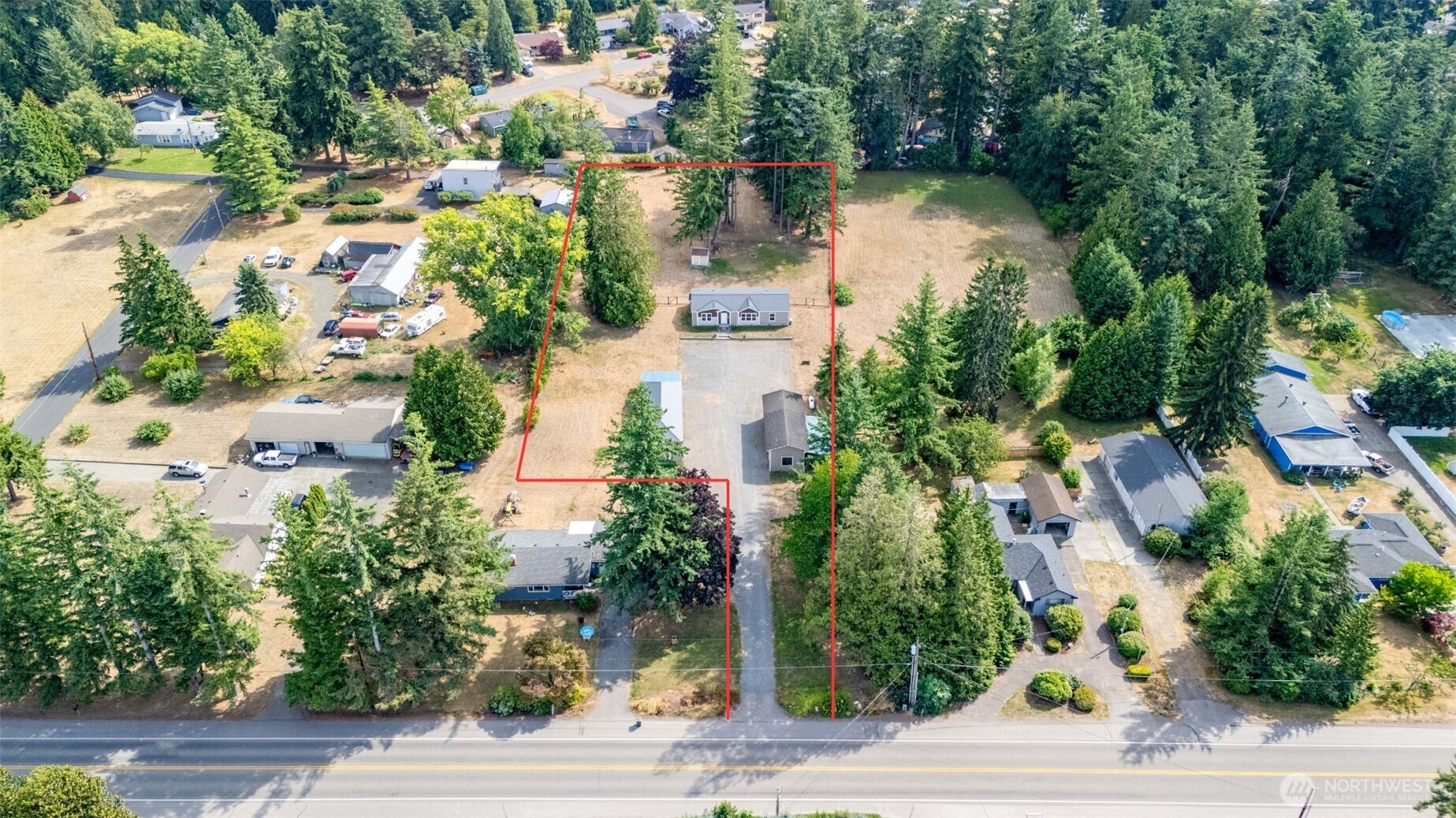 1229 West Axton Road Ferndale, WA 98248 - Photo 38 of 40 an aerial view of residential houses with outdoor space and lake view