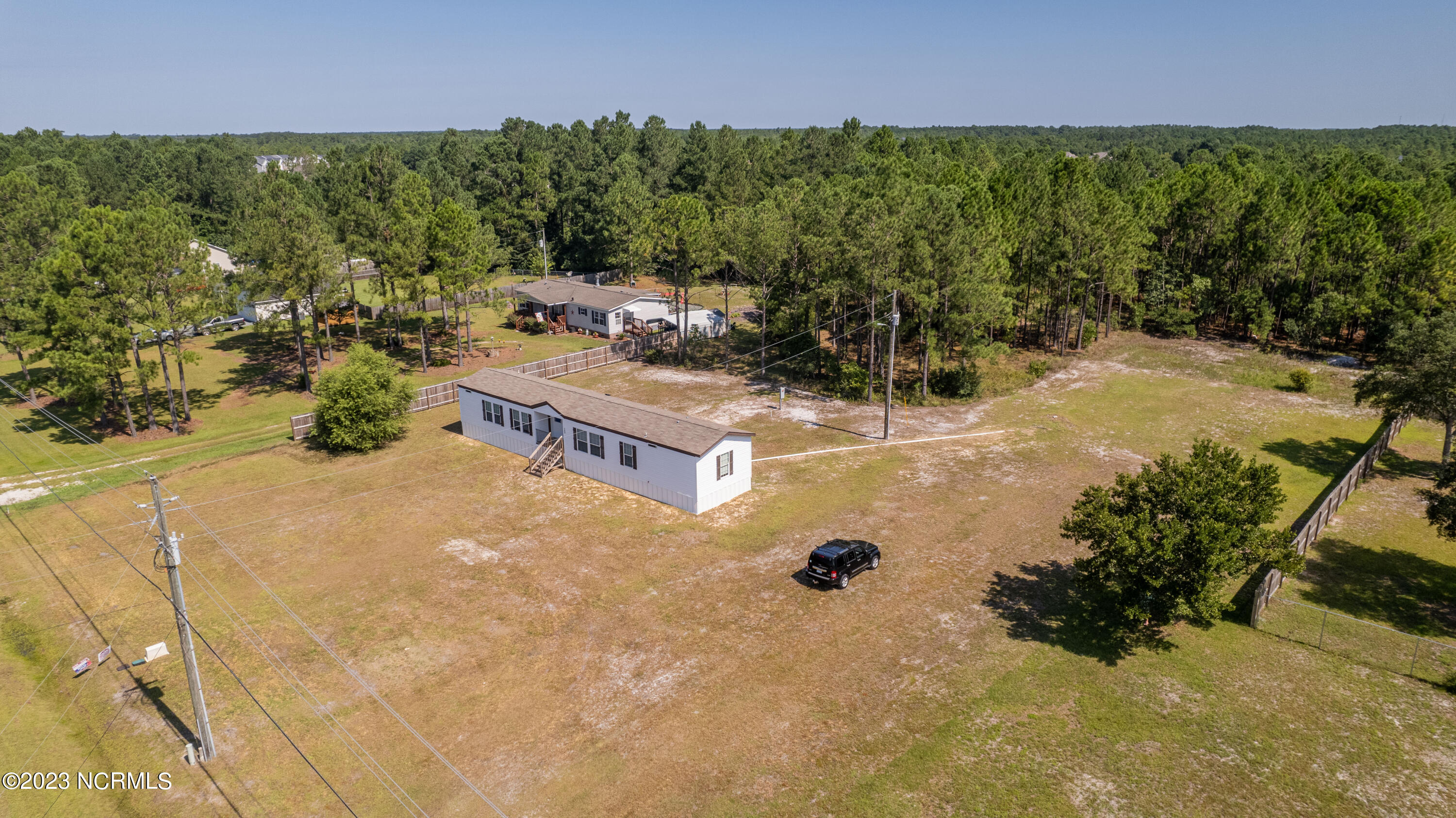 195 Folkstone Road Holly Ridge, NC 28445 - Photo 29 of 41 DJI_0143-HDR