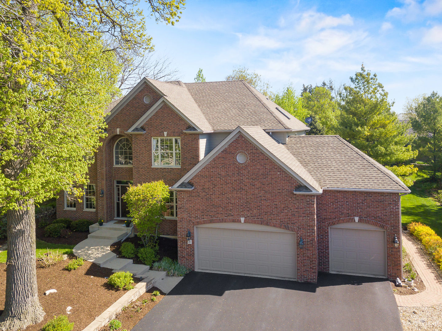 8 Winthrop New Road Sugar Grove, IL 60554 - Photo 2 of 38 a aerial view of a house with a yard and potted plants