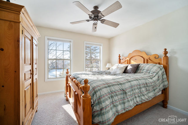 8 Winthrop New Road Sugar Grove, IL 60554 - Photo 21 of 38 a bedroom with a bed and a window