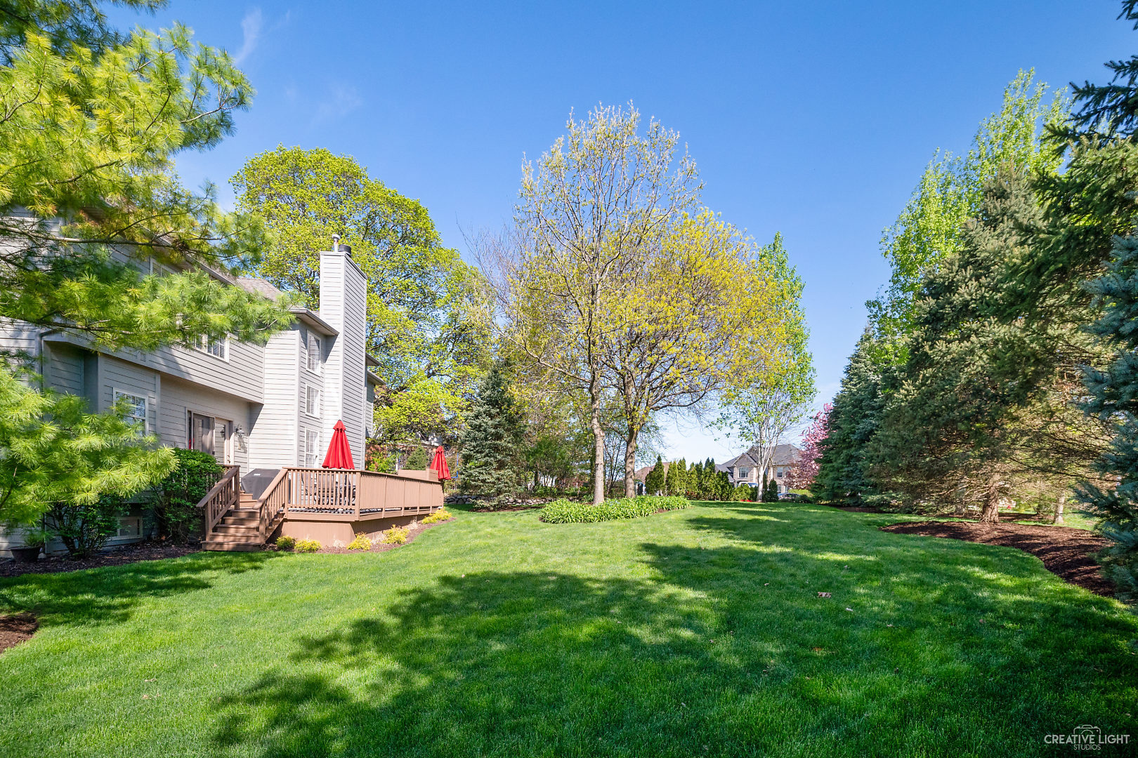 8 Winthrop New Road Sugar Grove, IL 60554 - Photo 31 of 38 a backyard of a house with lots of green space