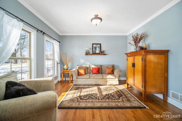 8 Winthrop New Road Sugar Grove, IL 60554 - Photo 5 of 38 a living room with furniture and a rug