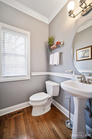 8 Winthrop New Road Sugar Grove, IL 60554 - Photo 8 of 38 a bathroom with a sink a toilet and mirror