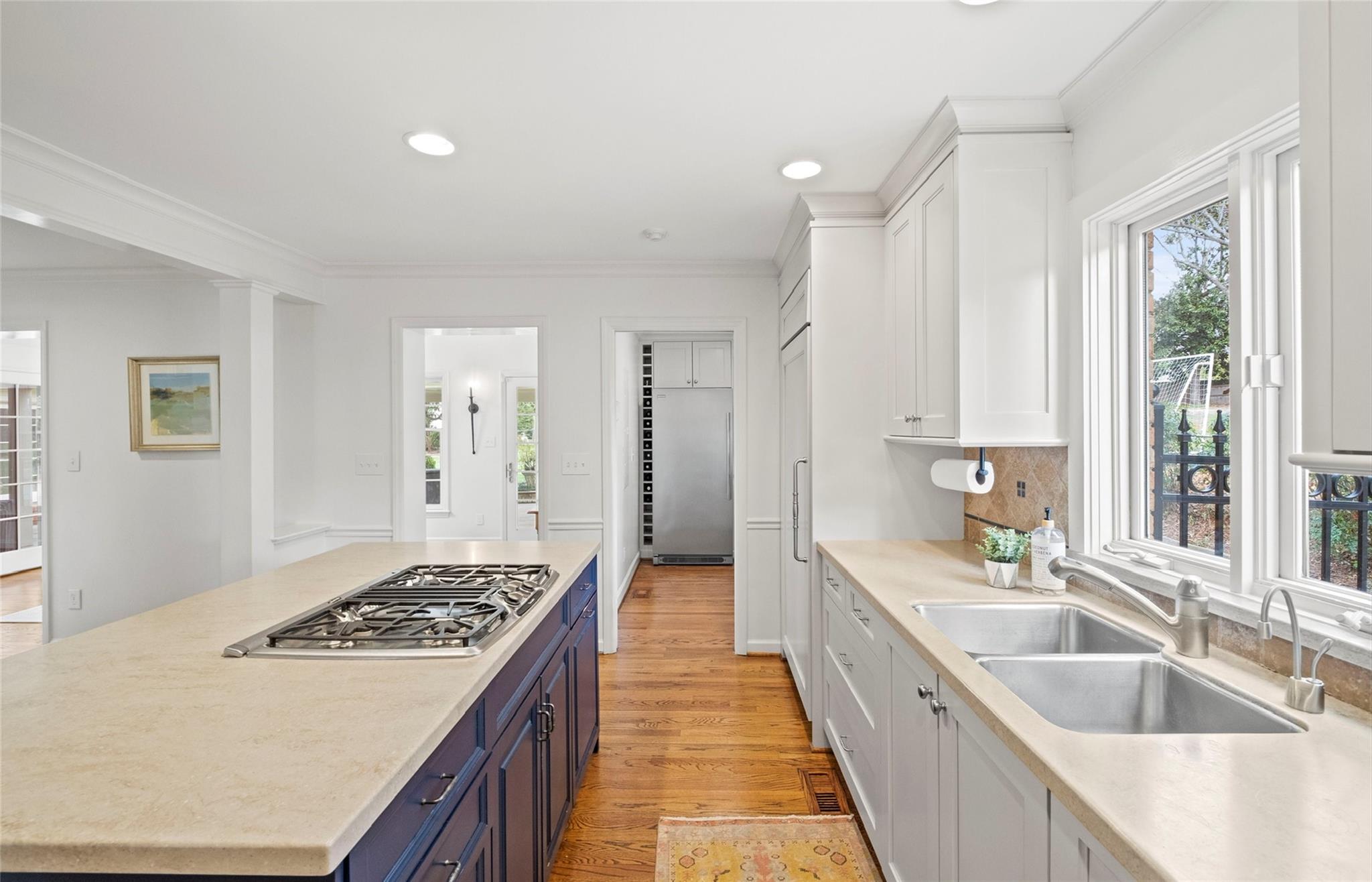 3136 Clarendon Road Charlotte, NC 28211 - Photo 14 of 47 a large kitchen with stainless steel appliances granite countertop a sink stove and refrigerator