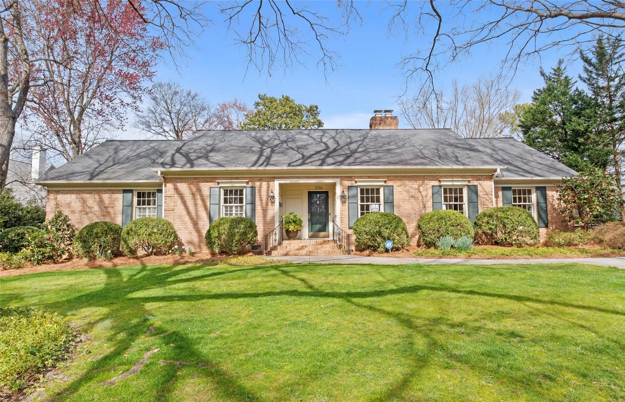 3136 Clarendon Road Charlotte, NC 28211 - Photo 2 of 47 a front view of a house with a yard