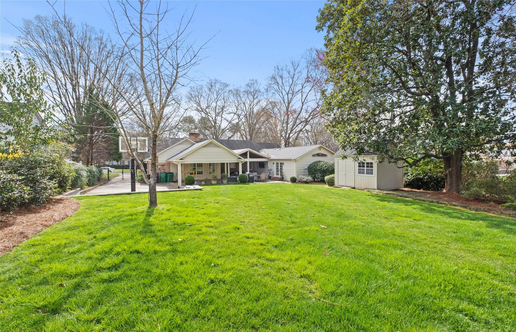 3136 Clarendon Road Charlotte, NC 28211 - Photo 47 of 47 a house with green field in front of it