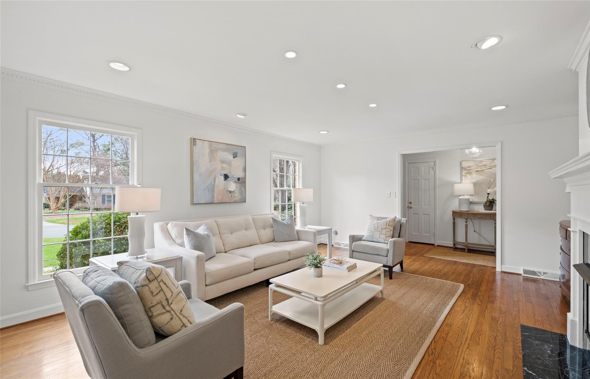 3136 Clarendon Road Charlotte, NC 28211 - Photo 6 of 47 a living room with furniture wooden floor and a large window