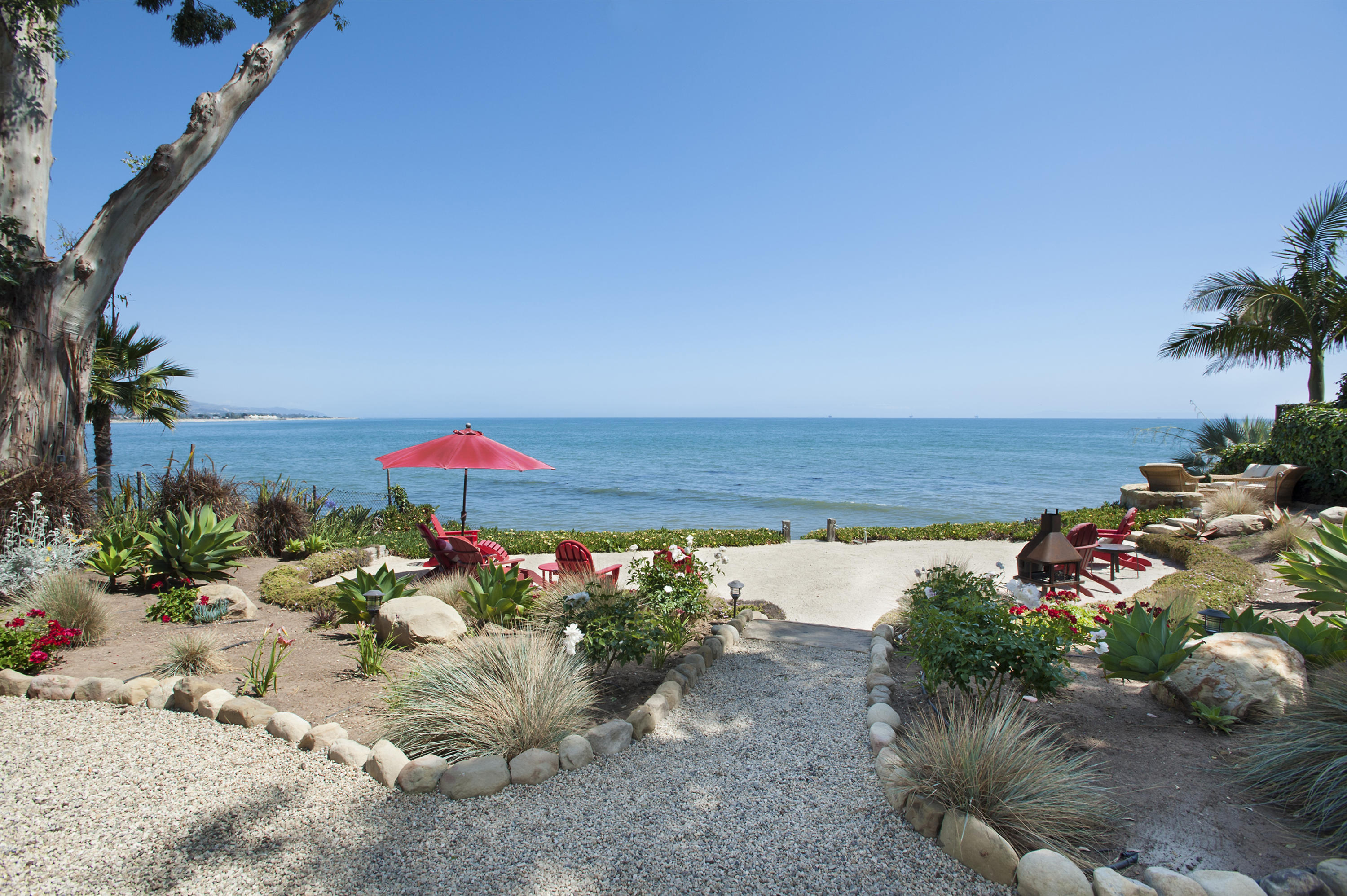 3284 Beach Club Road Carpinteria, CA 93013 - Photo 1 of 17 a view of a garden with an outdoor space