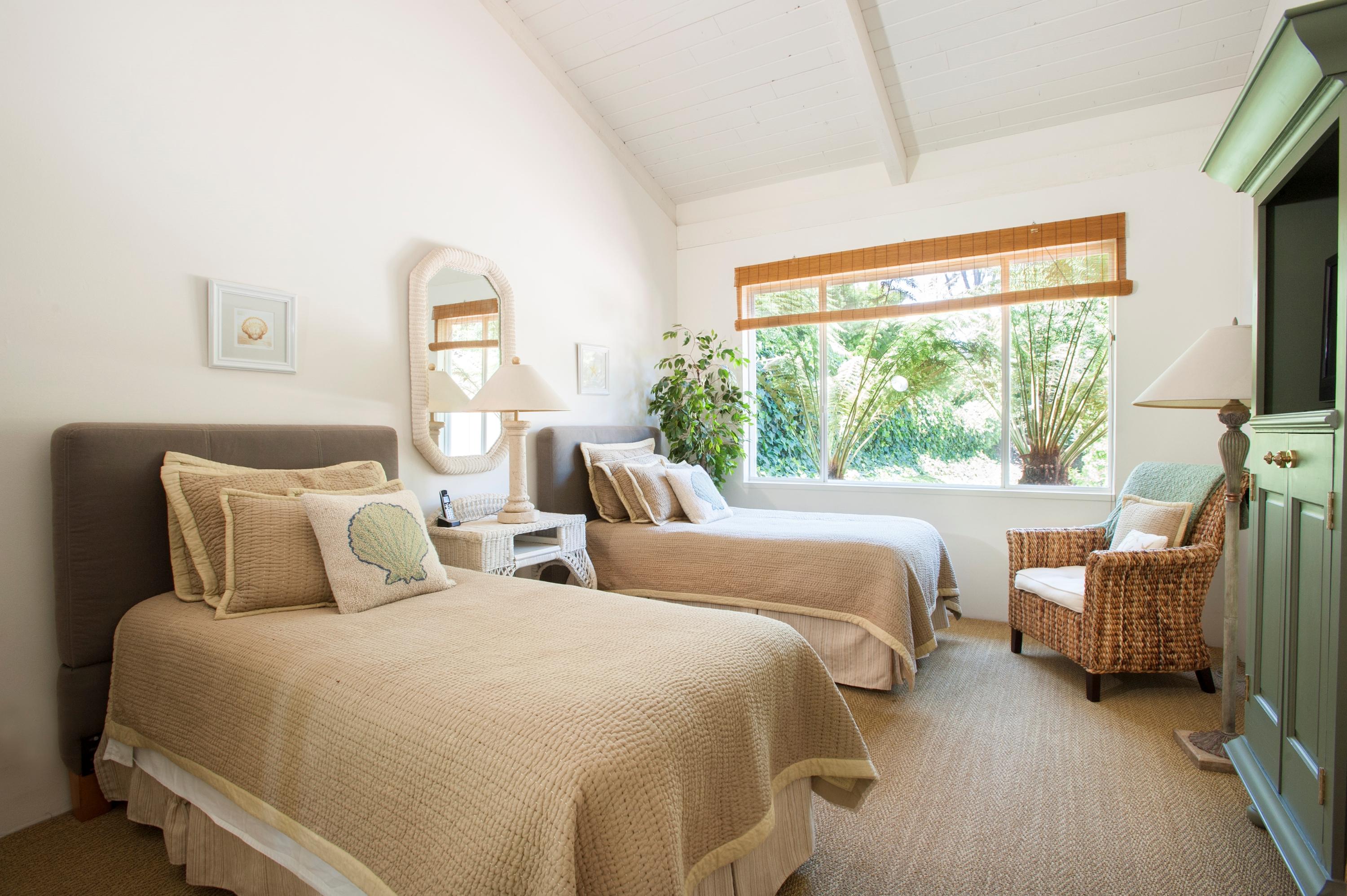 3284 Beach Club Road Carpinteria, CA 93013 - Photo 12 of 17 a bedroom with two beds and a large window