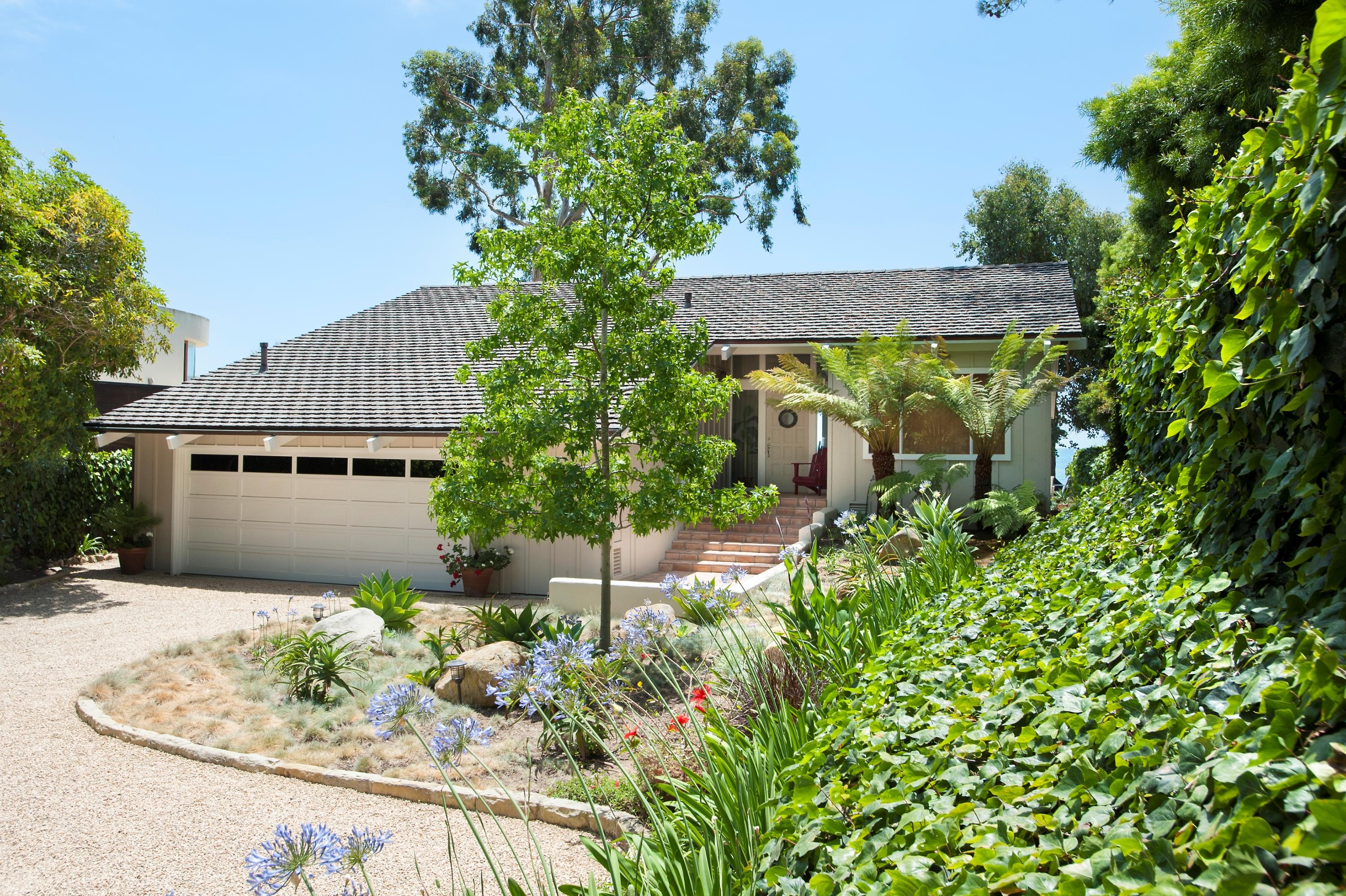 3284 Beach Club Road Carpinteria, CA 93013 - Photo 5 of 17 front view of a house with a yard