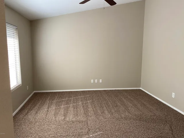 a bathroom with a sink a vanity and a mirror