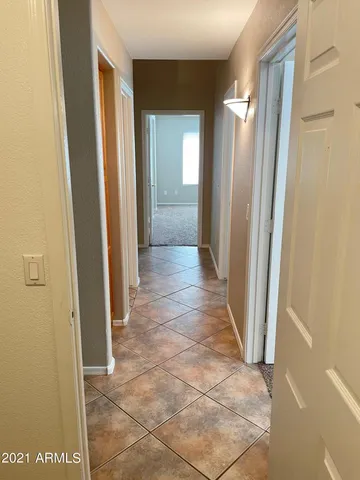 a bathroom with a double vanity sink toilet mirror and shower