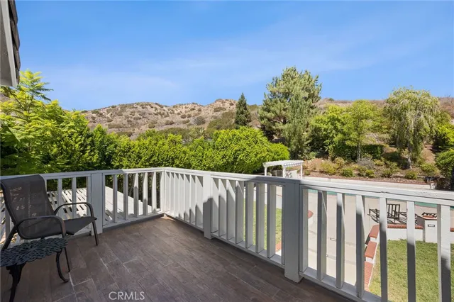 a balcony with a yard