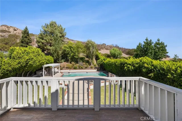 a bathroom with a double vanity sink bathtub and shower