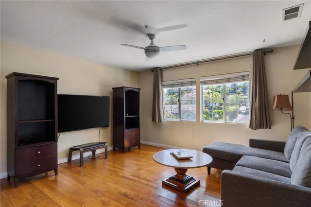 a bedroom with a bed and chair