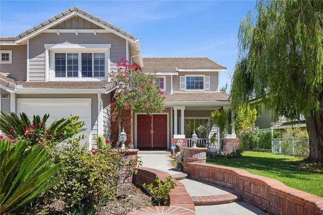 a view of a livingroom with furniture and front door
