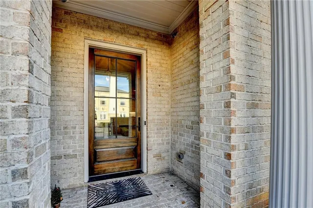 a swimming pool with outdoor seating and yard