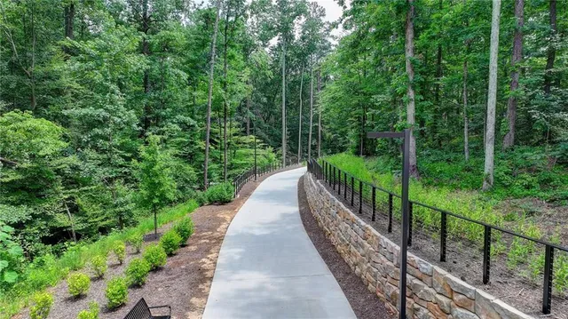 a front view of a house with parking area