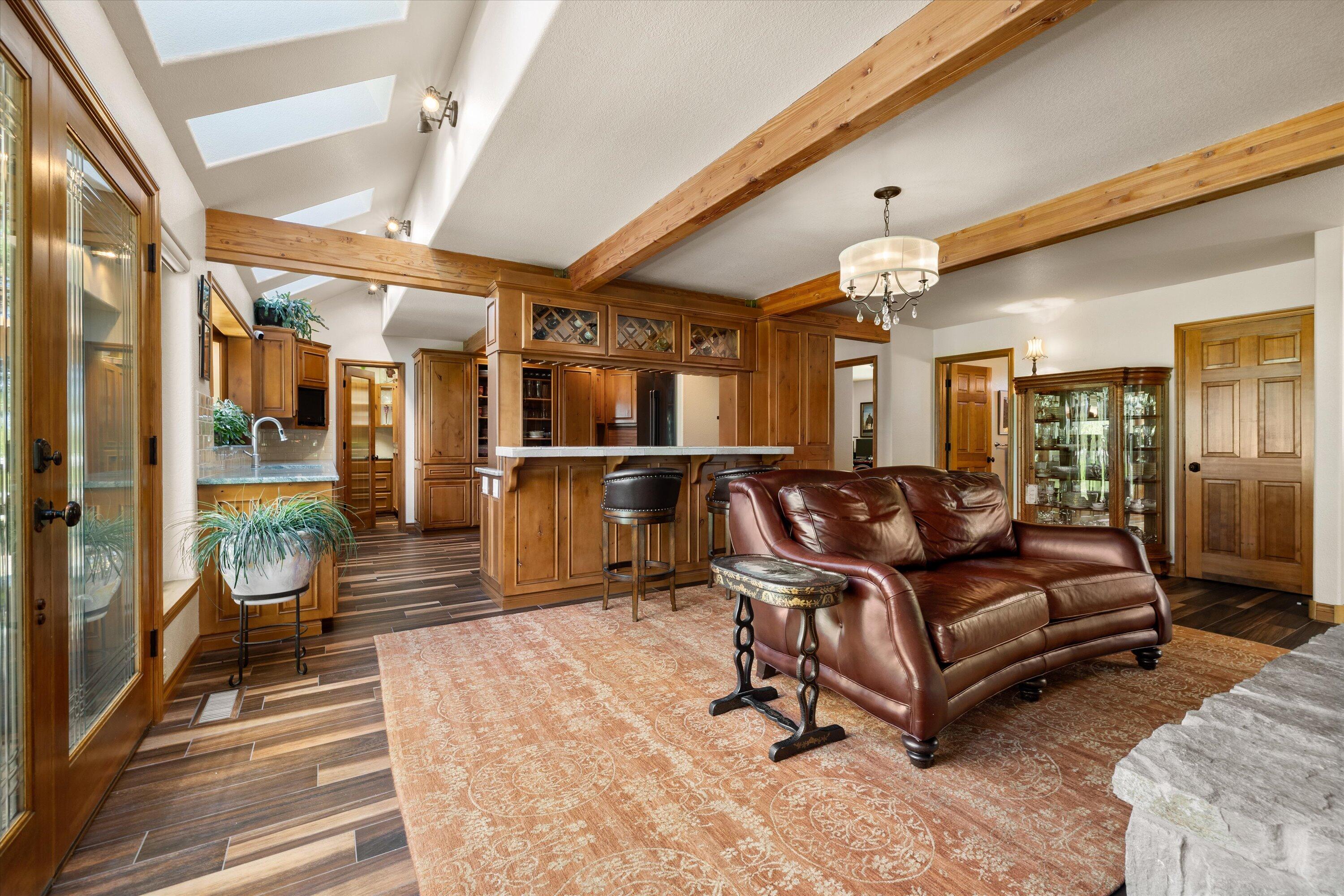 60604 Woodside Road Bend, OR 97702 - Photo 13 of 99 sitting area with fireplace was used previously as the dining area