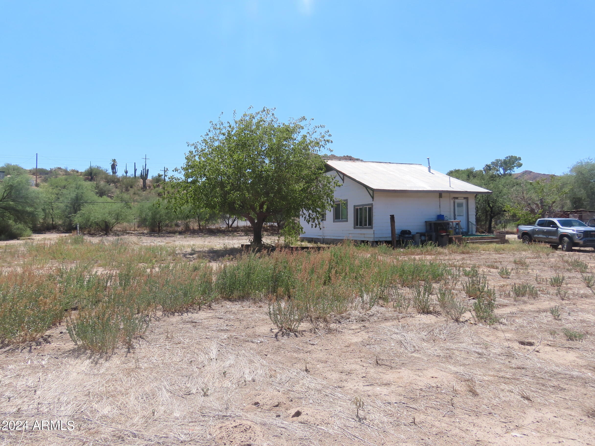 56120 East Riverside Road Kearny, AZ 85137 - Photo 13 of 28 a view of a lake with houses