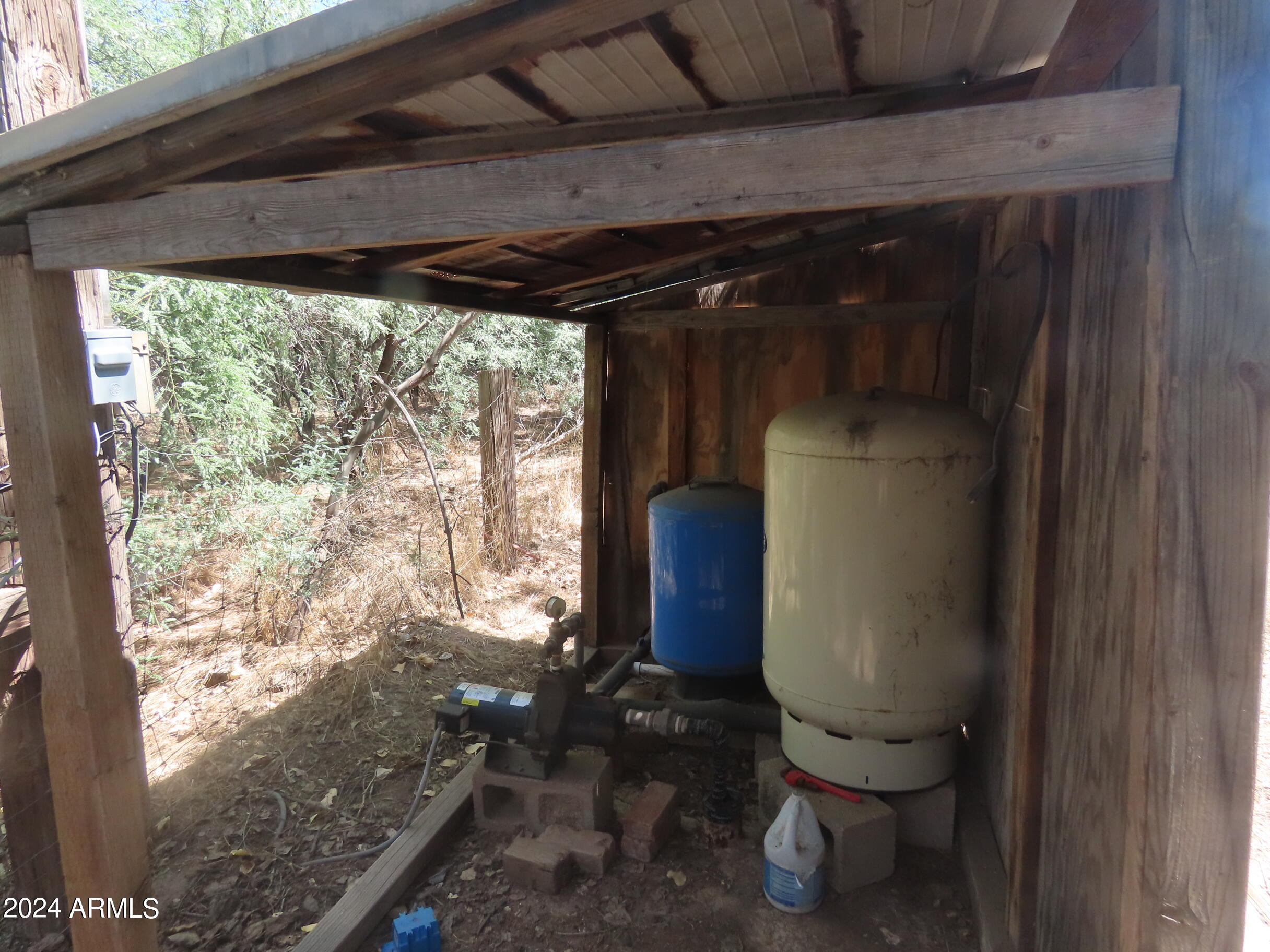 56120 East Riverside Road Kearny, AZ 85137 - Photo 16 of 28 a bathroom with a toilet and a shower
