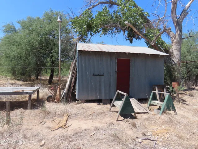 a house view with a backyard space