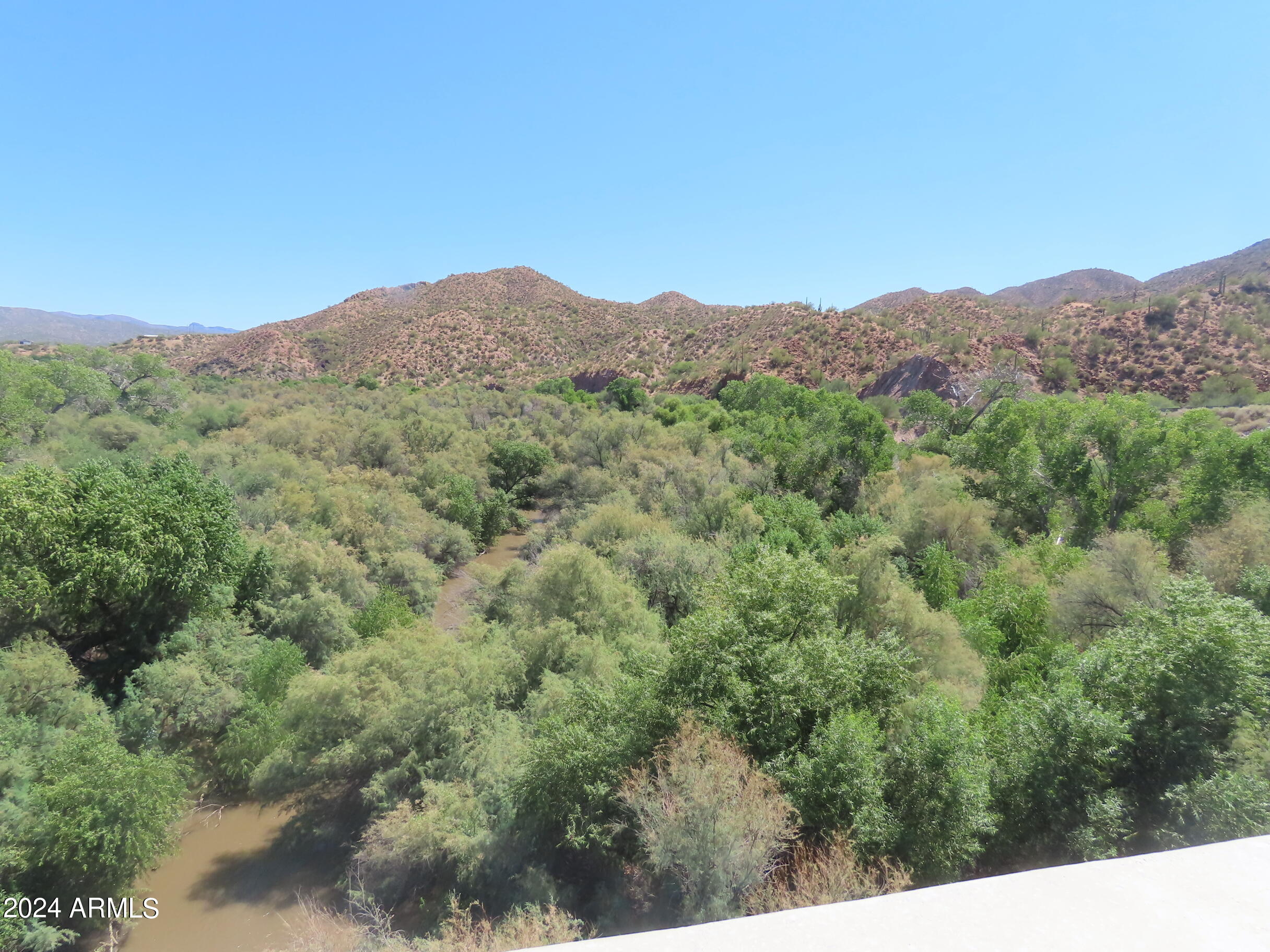 56120 East Riverside Road Kearny, AZ 85137 - Photo 23 of 28 a view of a lush green field
