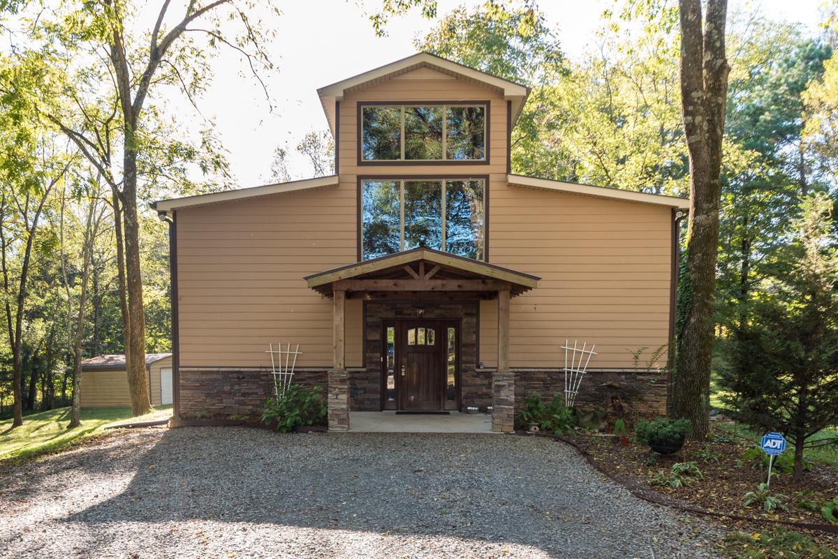 3838 W Road Springfield, TN 37172 - Photo 3 of 30 a front view of a house with garden