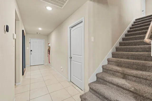 a view of an entryway with staircase