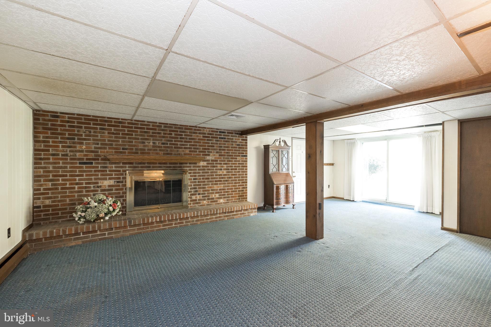 8 Benburb Road Phoenixville, PA 19460 - Photo 19 of 23 Wood-burning Brick Fireplace