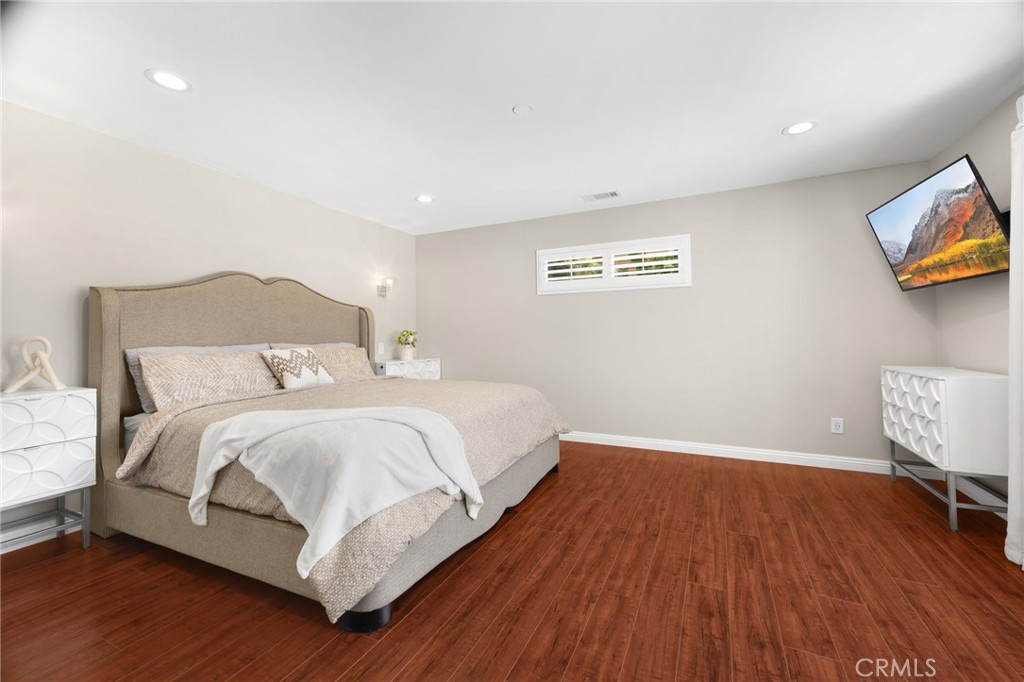 836 Willow Drive Brea, CA 92821 - Photo 14 of 35 a bedroom with a bed and chair