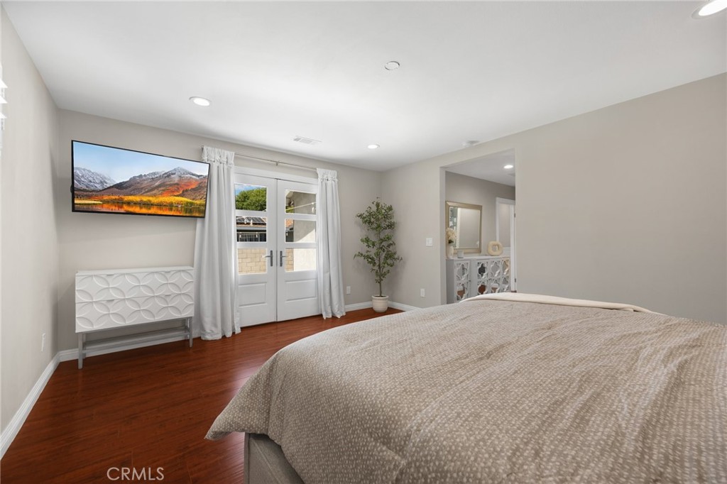 836 Willow Drive Brea, CA 92821 - Photo 16 of 35 a bedroom with a bed and a painting on the wall