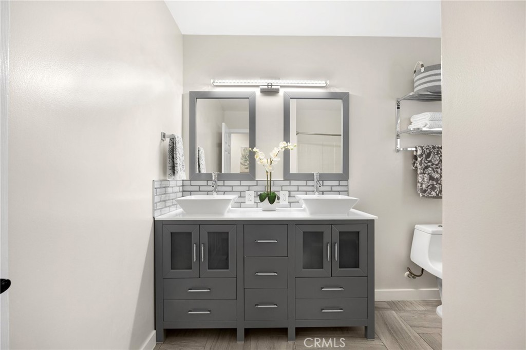 836 Willow Drive Brea, CA 92821 - Photo 21 of 35 a bathroom with a sink and a mirror