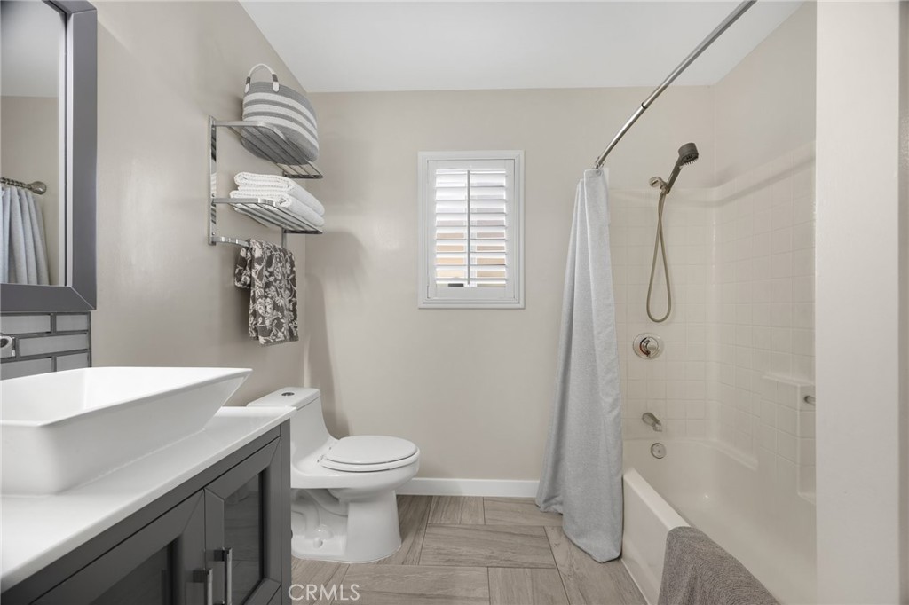 836 Willow Drive Brea, CA 92821 - Photo 22 of 35 a bathroom with a sink a toilet and shower