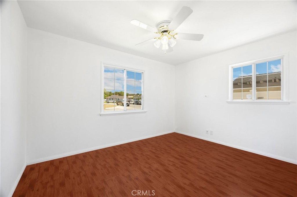 836 Willow Drive Brea, CA 92821 - Photo 23 of 35 a view of an empty room with wooden floor and a window
