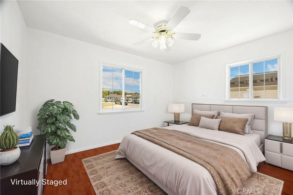 836 Willow Drive Brea, CA 92821 - Photo 25 of 35 a bedroom with a bed and a potted plant