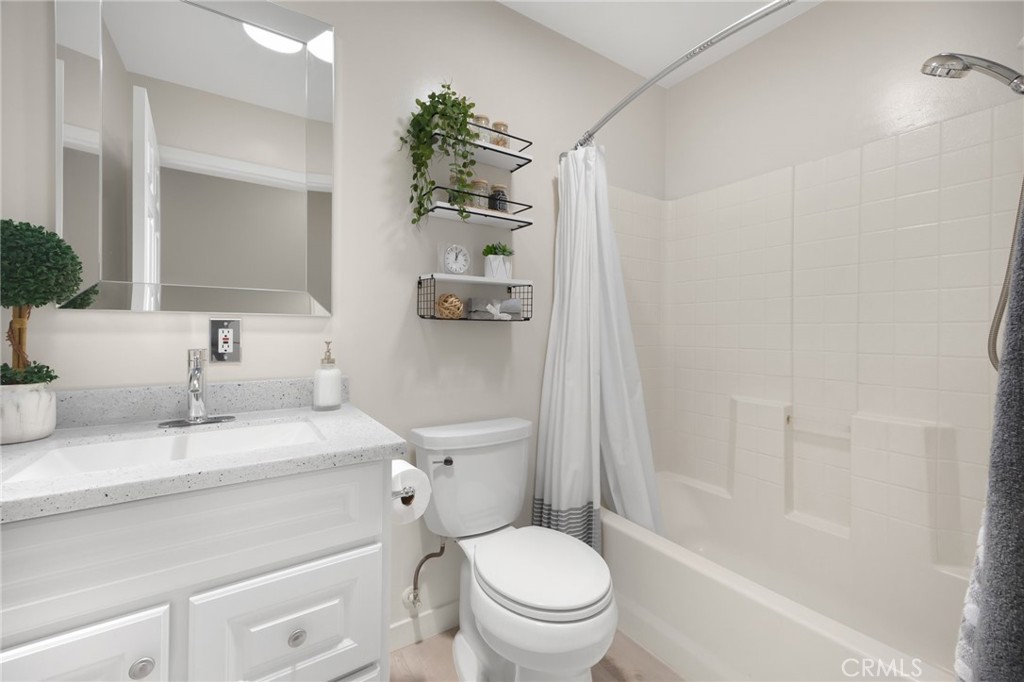 836 Willow Drive Brea, CA 92821 - Photo 26 of 35 a bathroom with a granite countertop sink toilet and shower