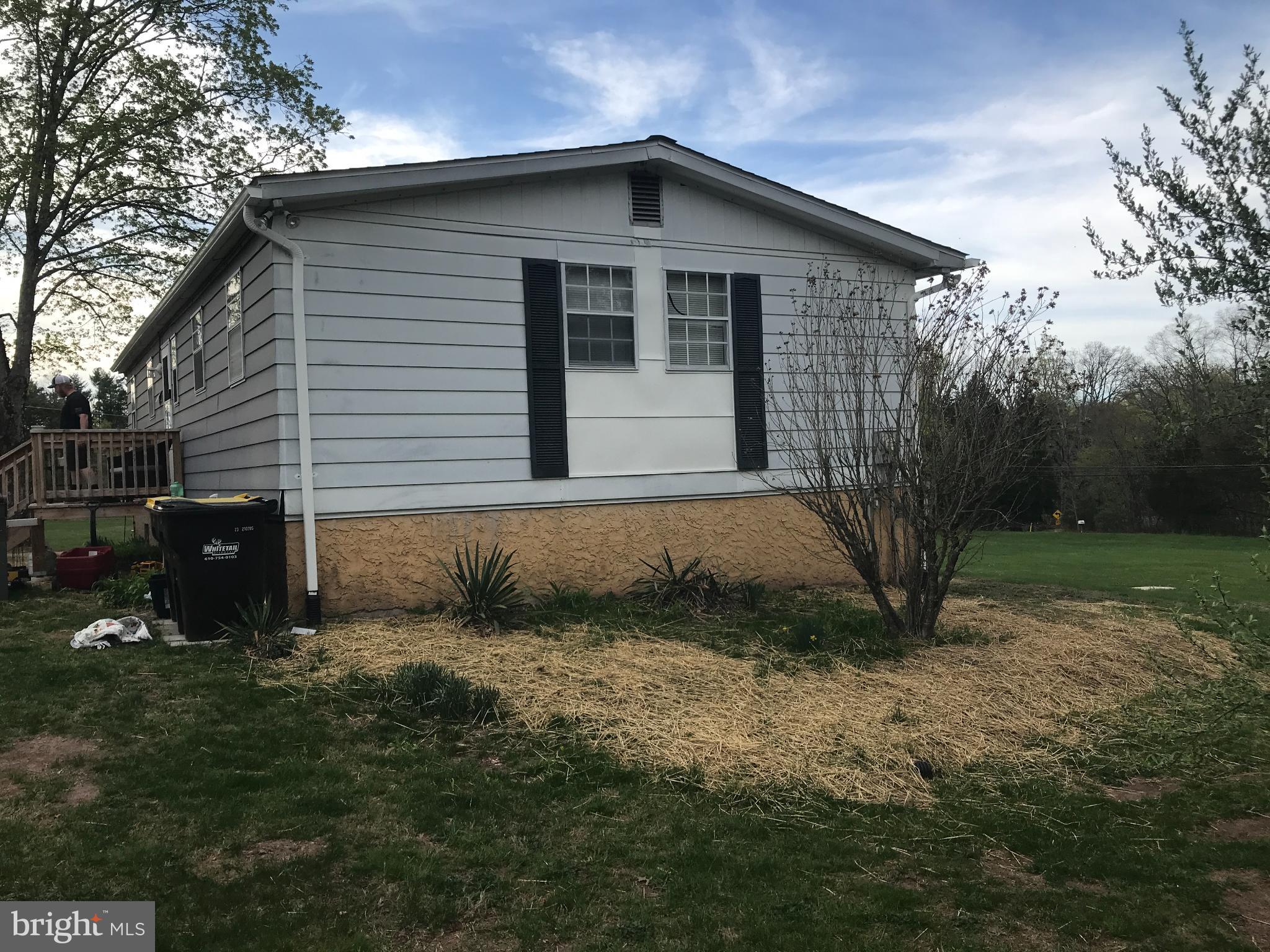 3218 Fennel Road Pennsburg, PA 18073 - Photo 7 of 7 Charming home with lush green surroundings.