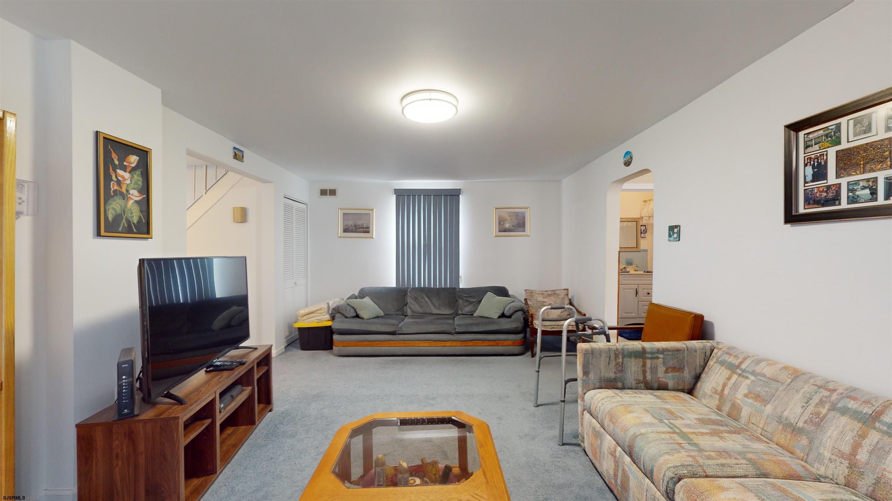 424 Pratt Street Hammonton, NJ 08037 - Photo 18 of 41 a living room with furniture and a flat screen tv