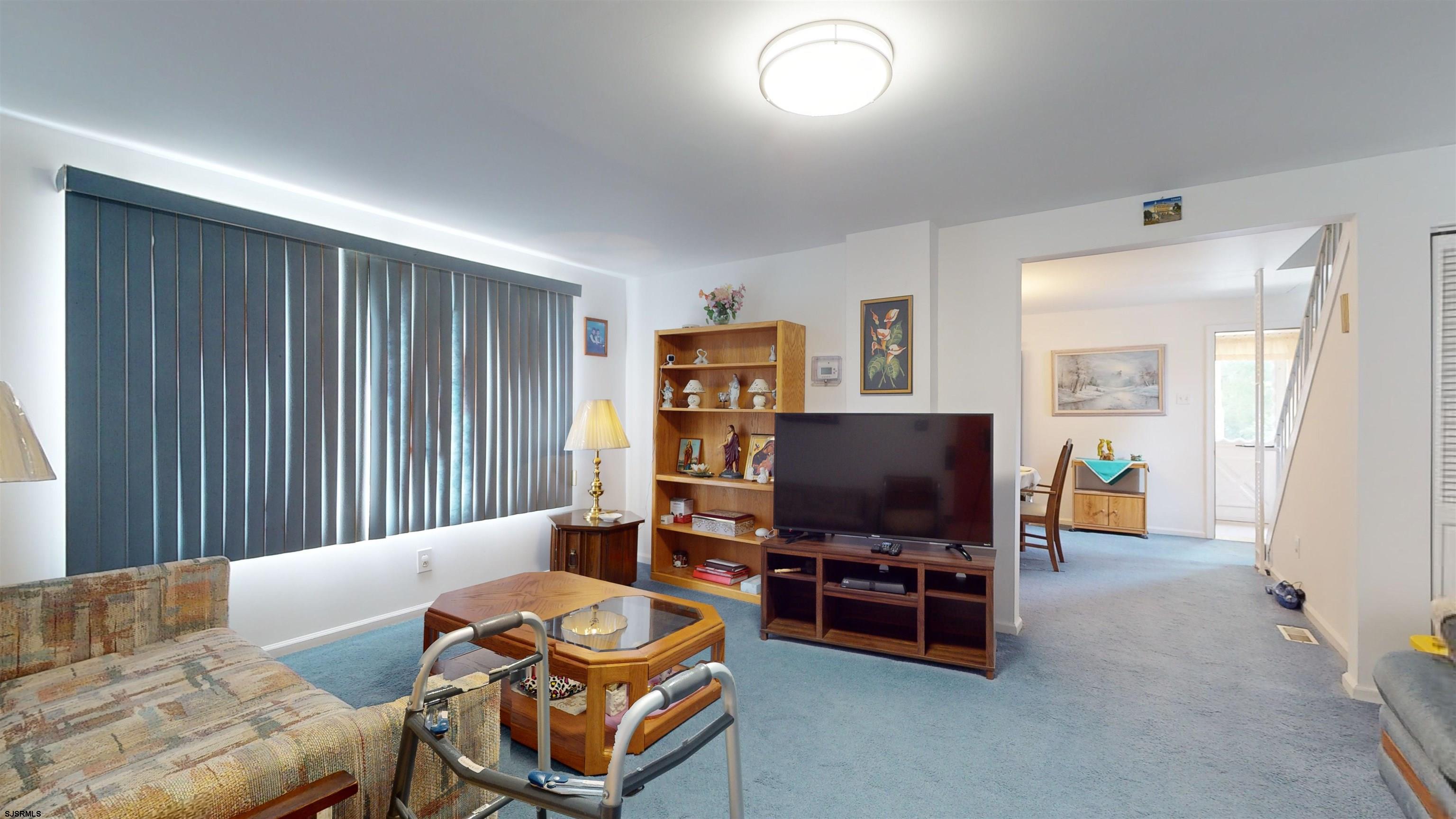 424 Pratt Street Hammonton, NJ 08037 - Photo 19 of 41 a living room with furniture and a flat screen tv