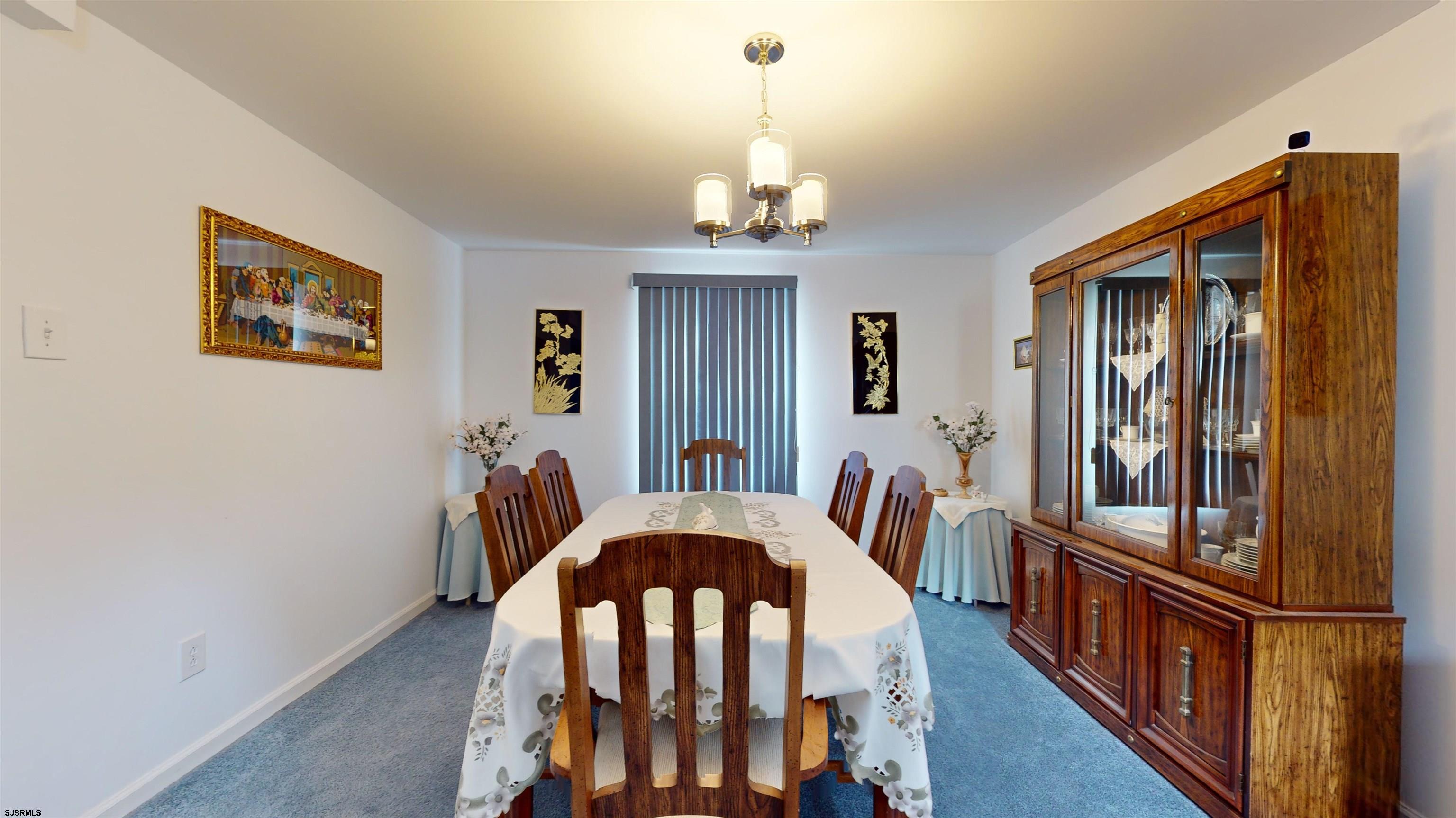 424 Pratt Street Hammonton, NJ 08037 - Photo 20 of 41 a view of a dining room with furniture window and wooden floor