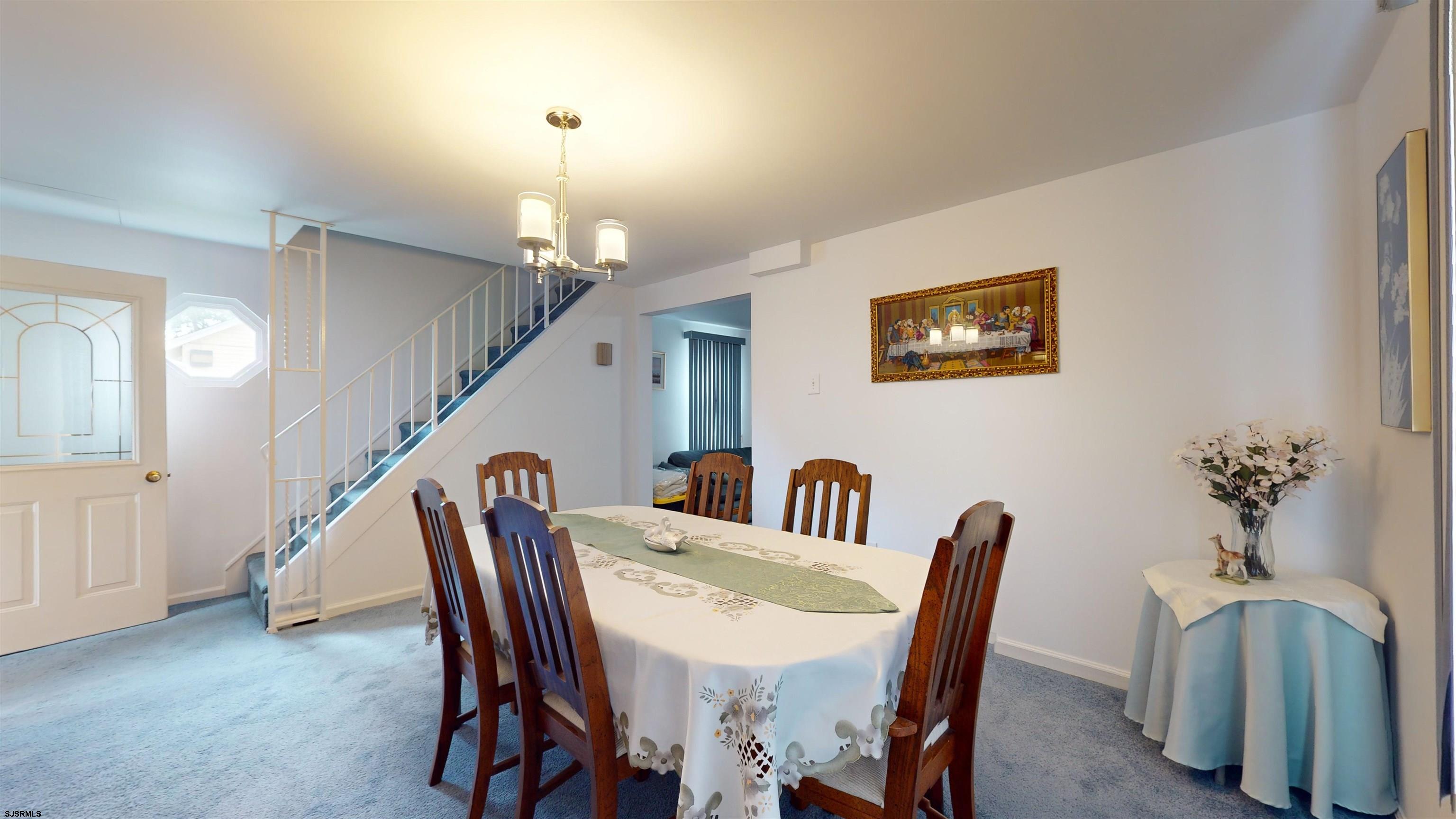 424 Pratt Street Hammonton, NJ 08037 - Photo 21 of 41 a view of a dining room with furniture and wooden floor