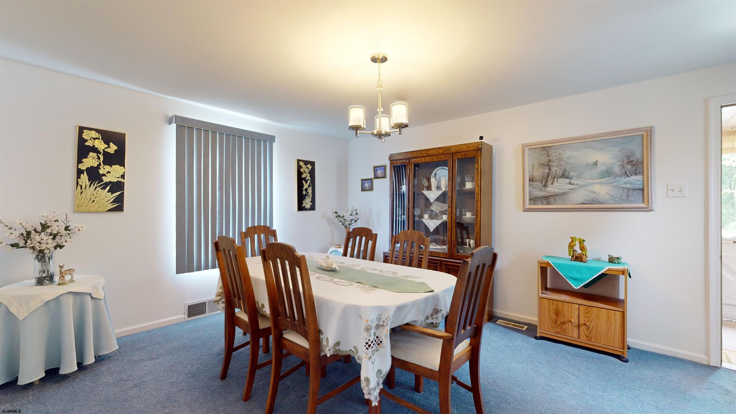 424 Pratt Street Hammonton, NJ 08037 - Photo 22 of 41 a dining room with furniture a livingroom and window