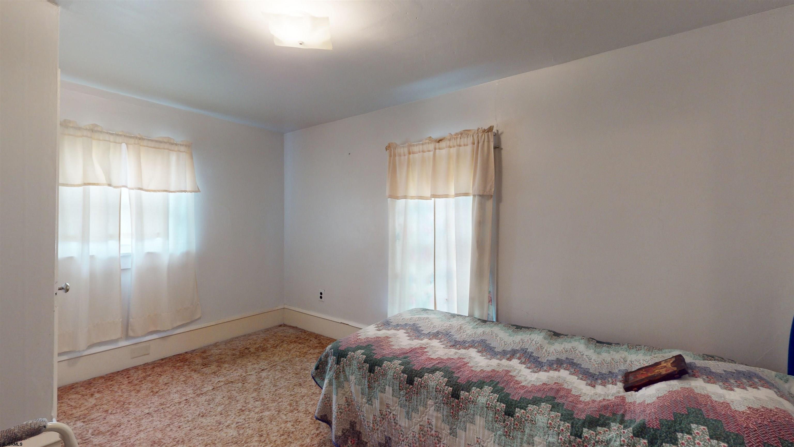 424 Pratt Street Hammonton, NJ 08037 - Photo 27 of 41 a bedroom with a bed and a window
