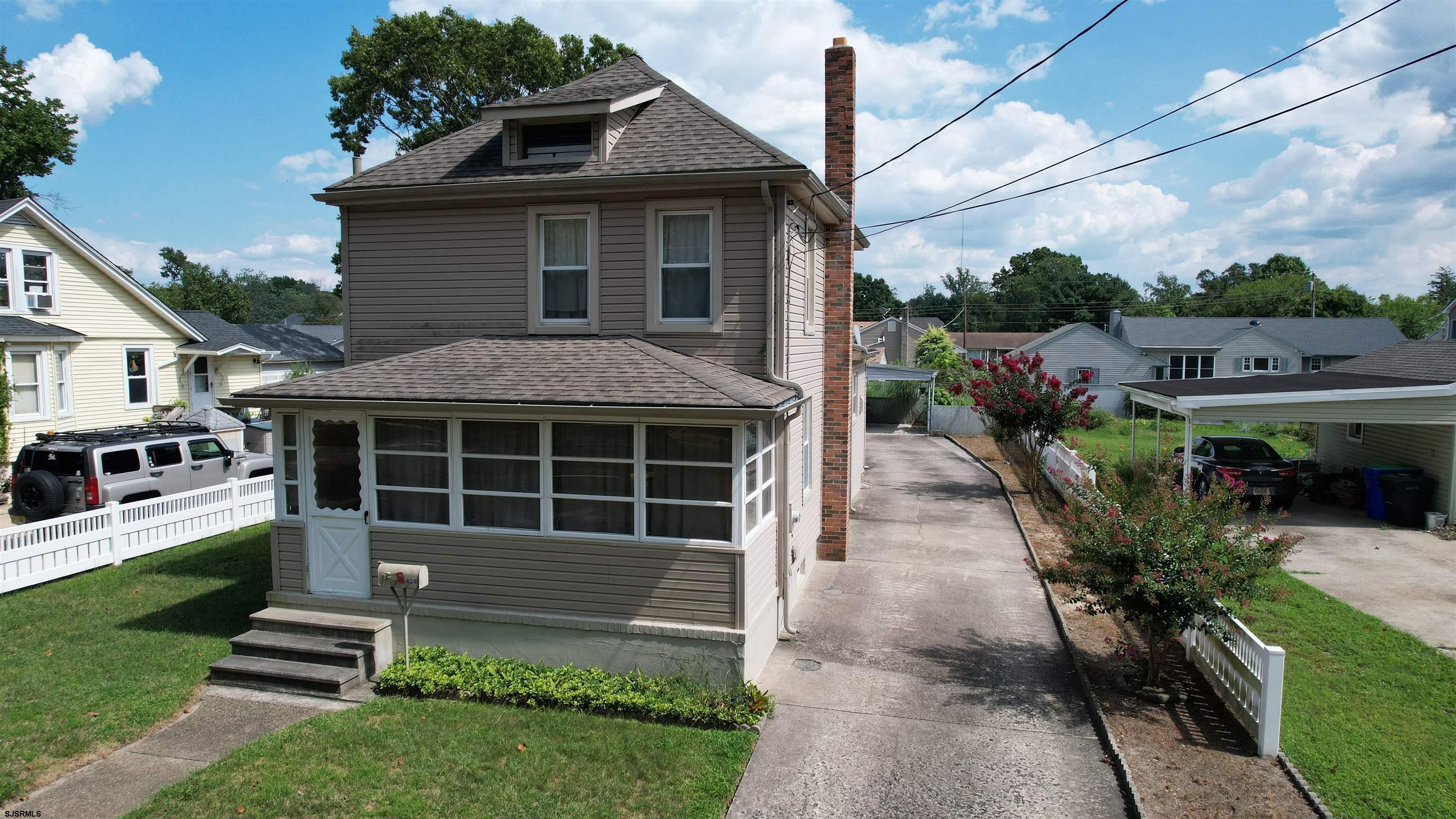 424 Pratt Street Hammonton, NJ 08037 - Photo 3 of 41 a front view of a house with a yard