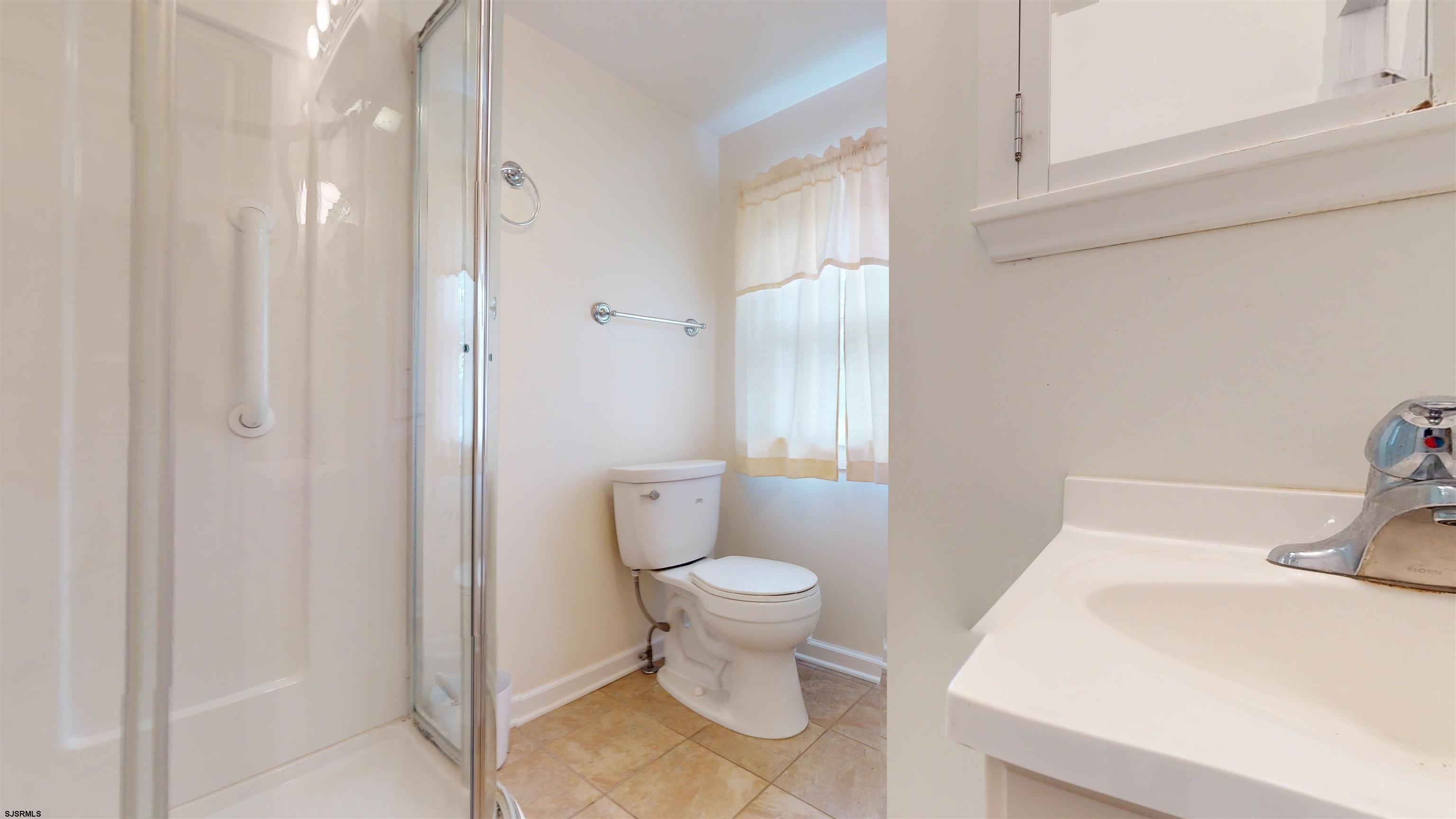 424 Pratt Street Hammonton, NJ 08037 - Photo 32 of 41 a bathroom with a sink and a toilet