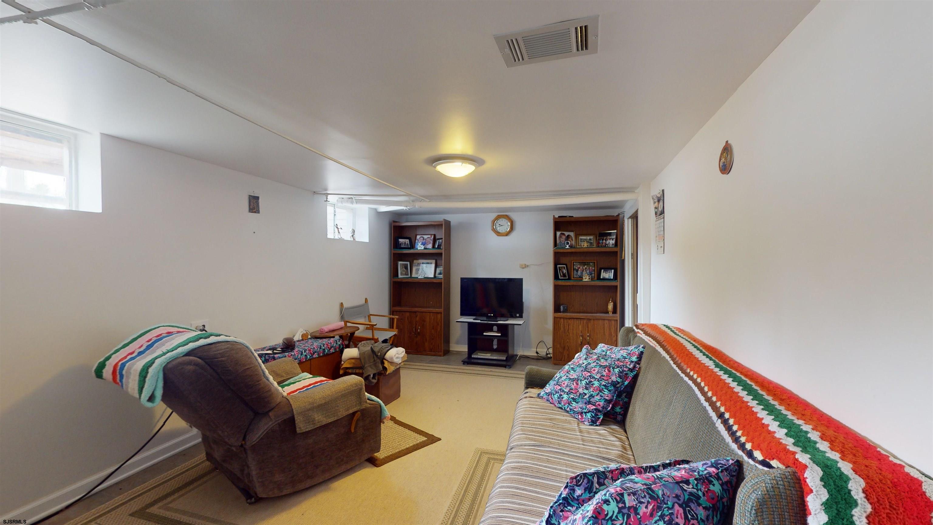 424 Pratt Street Hammonton, NJ 08037 - Photo 36 of 41 a living room with furniture and walk in closet