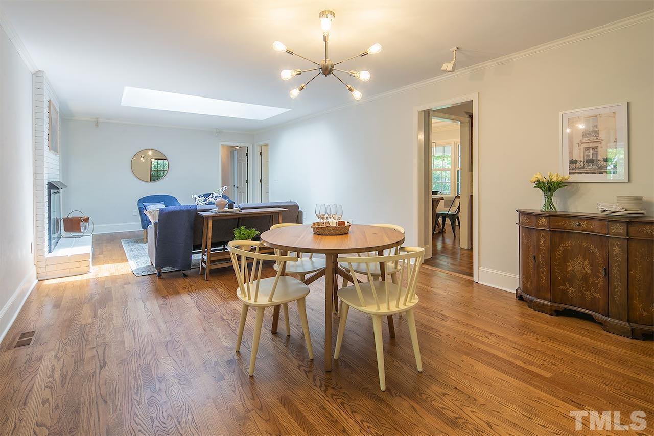 6420 Brandywine Road Raleigh, NC 27607 - Photo 13 of 28 a view of a dining room with furniture and wooden floor